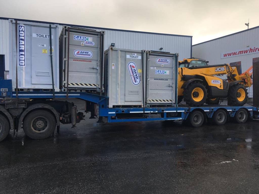 Load of solar loo's & 9 meter JCB heading on a rental project